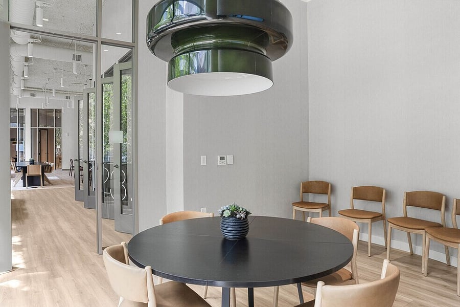 Where refined design meets clear purpose.
Collaborate effortlessly in a modern, well-equipped meeting room.