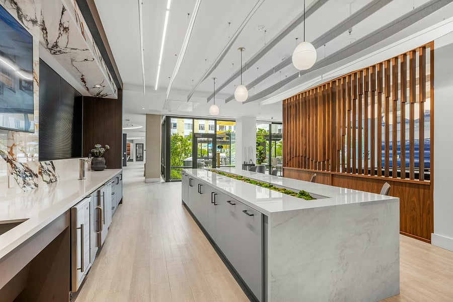 A modern communal demo kitchen complemented by a polished bar area.
Perfect for relaxing with good company and great conversation.