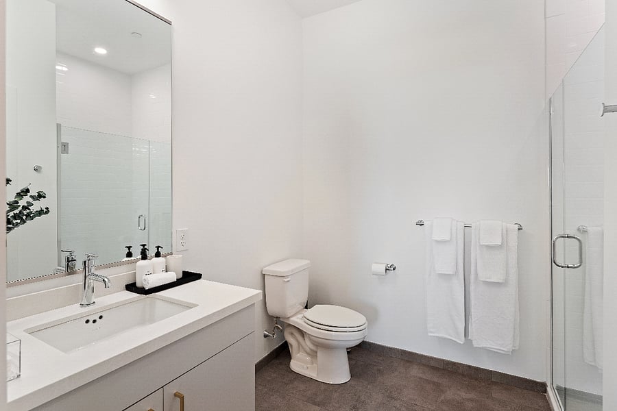 Bright, clean bathroom with crisp finishes and spa-inspired touches.
Your private retreat for a soothing shower or bath.