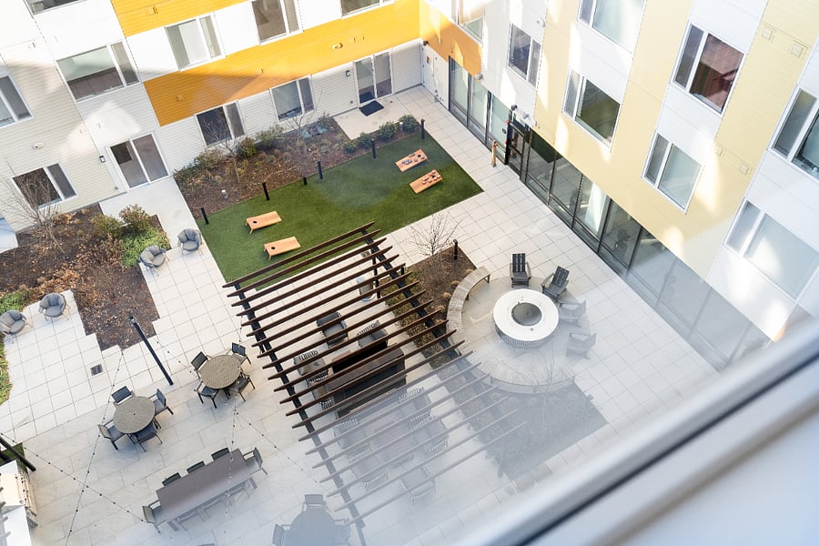 Courtyard view from the comfort of your upper floor apartment. Beautiful.