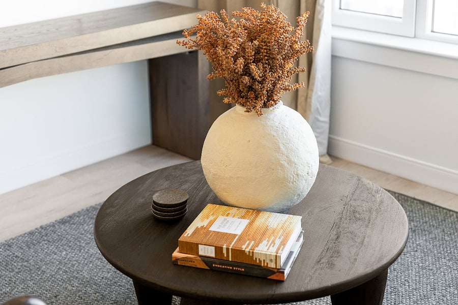 Sink into comfort in this airy, open-concept living room.
Your perfect home base for rest and relaxation.