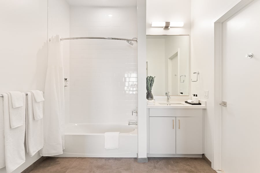 This bathroom features crisp design and practical luxury throughout.
Bright, fresh, and ready for your daily routine.