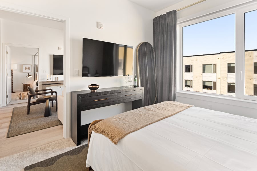 A spacious bedroom filled with natural light and cozy touches.
The perfect space to settle in and feel at home.
