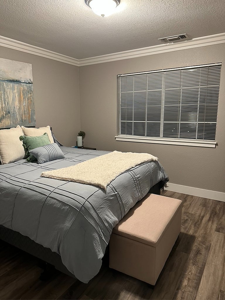 Comfortable bedroom with smart TV