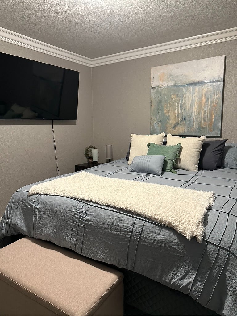 Comfortable bedroom with smart TV