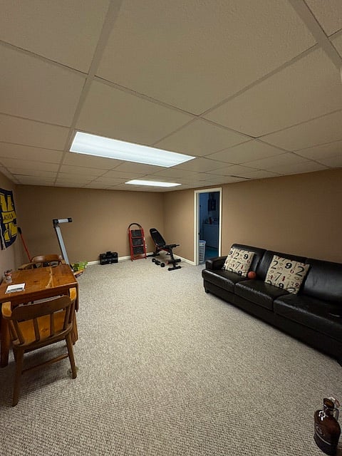 basement room - contains rower and workout bench