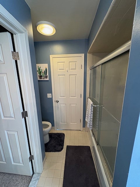 Upstairs Full Bath - Shower. Connection to Bedroom #1 and hallway