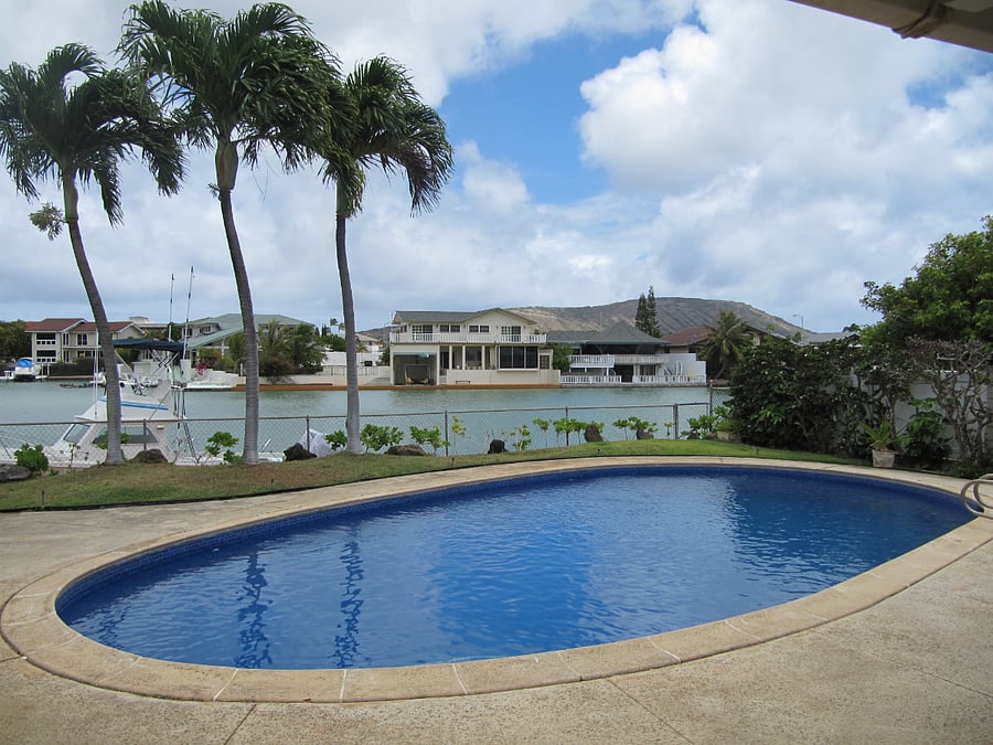 Makapuu Blue Pool and Marina. The hedge is now grown up and blocks the fence and creates privacy with marina views.