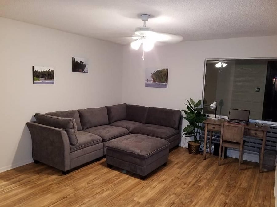 Couch and desk area for work and relaxing.
