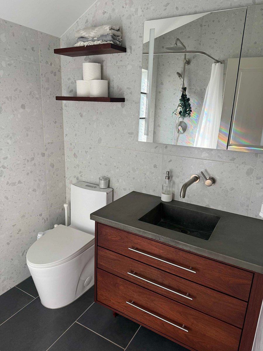 Recently remodeled, private 3/4 bath, with plenty of storage in medicine cabinet and vanity