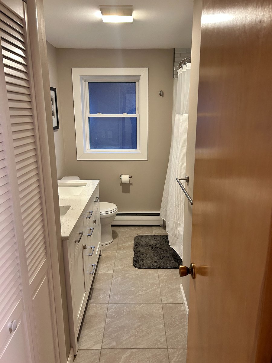 Full upstairs bathroom with shower and tub