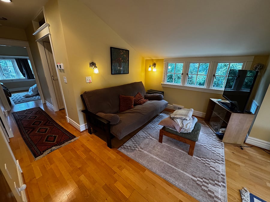 open living room, hallway toward bedroom