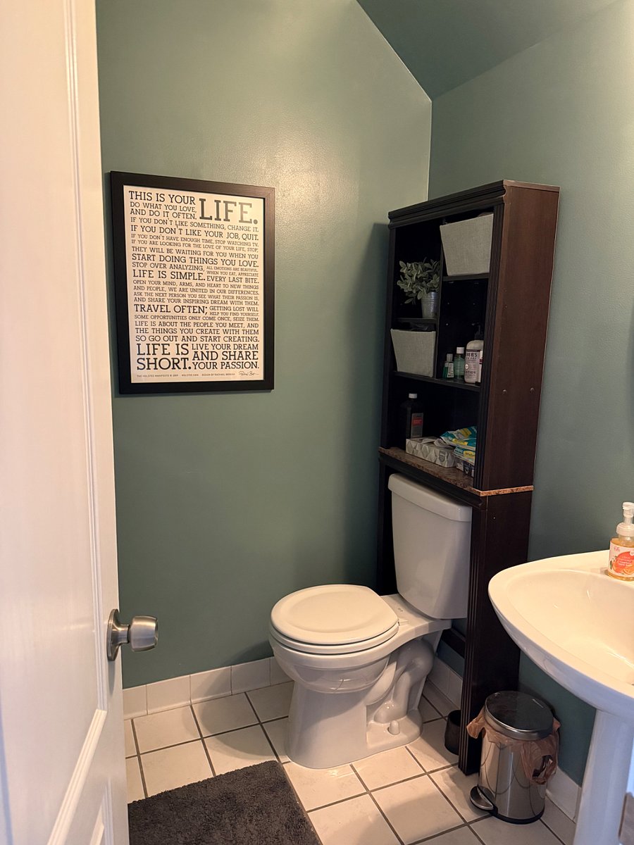 Half bath off of the shared living room