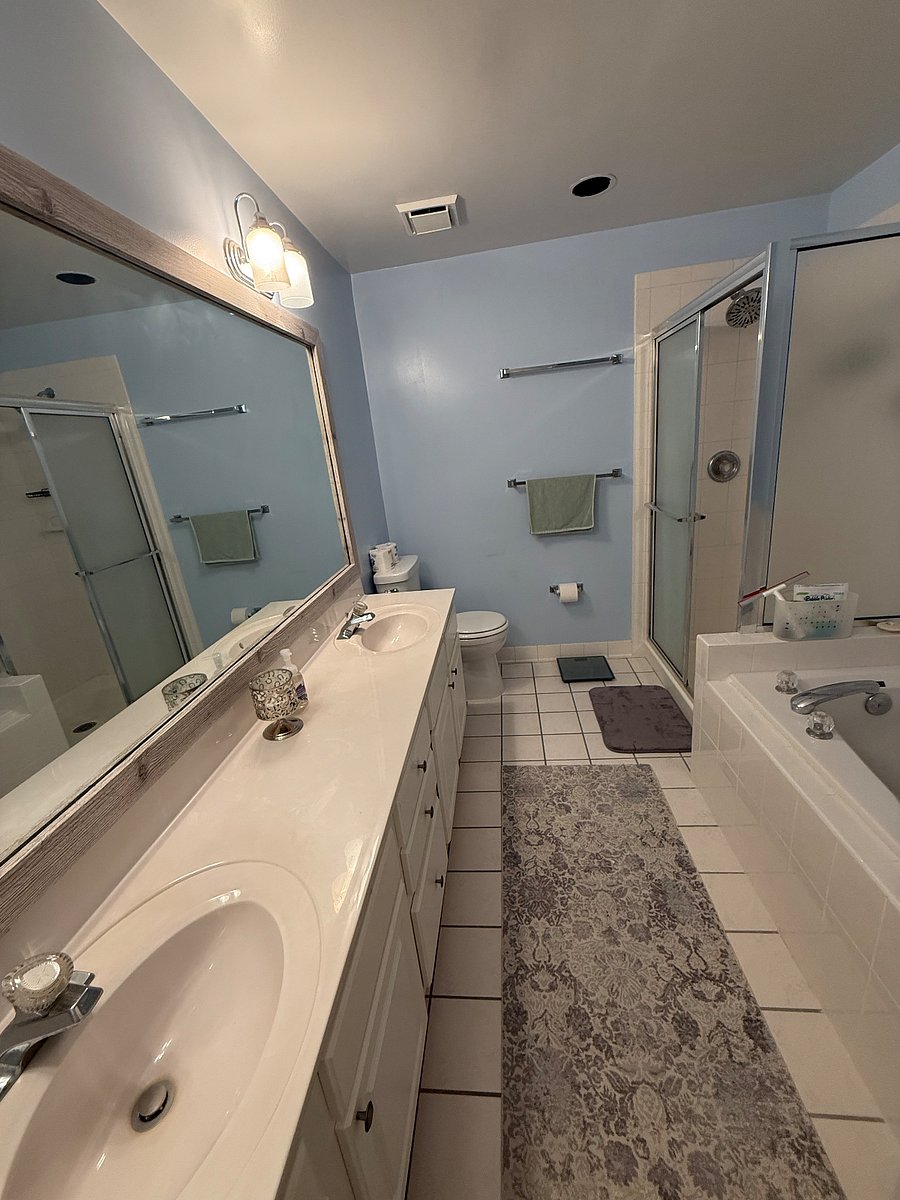 Your Master bath with dual sinks, shower, and tub