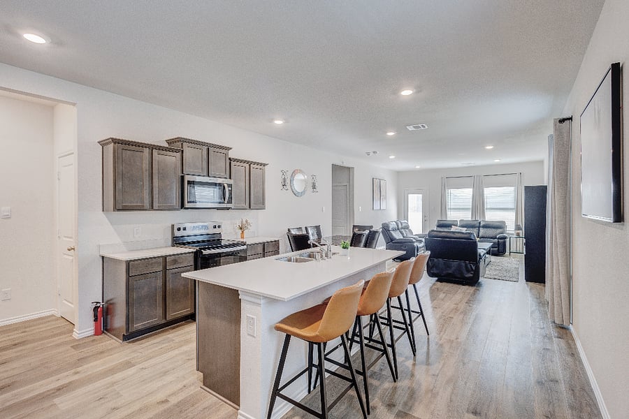Bright open layout offering comfortable shared living and dining space, perfect for cooking and relaxing.