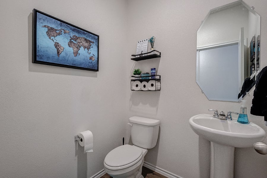 Convenient downstairs half bath for quick access.