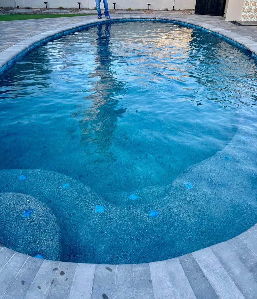 Remodeled pool with pebbletec