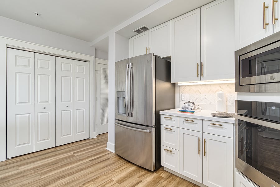 Laundry closet adjacent to kitchen!