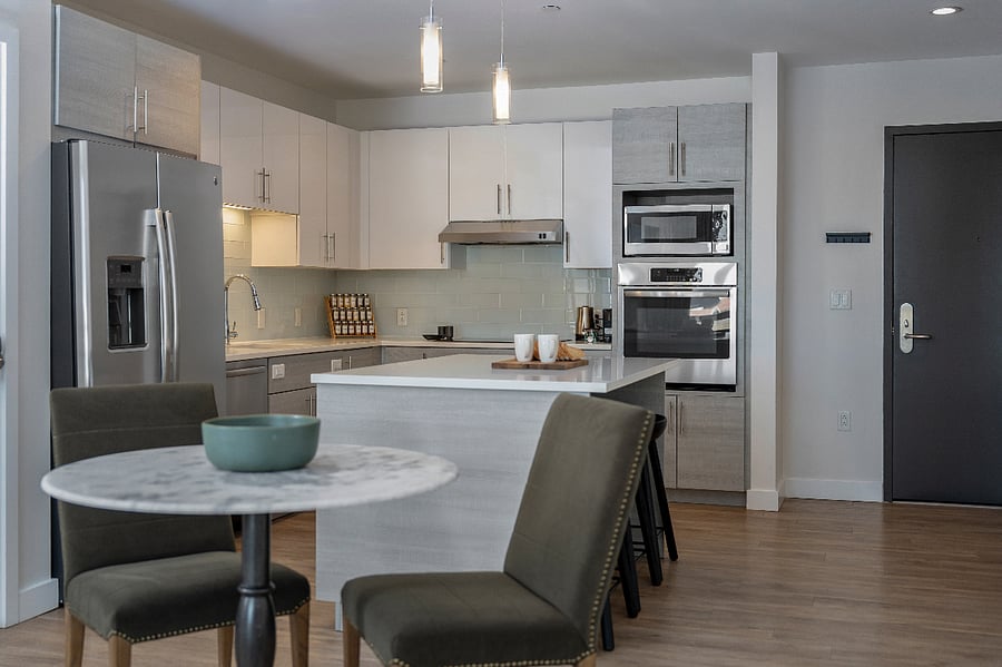 Warm textures and elevated details define this inviting kitchen.
Dine, unwind, and enjoy life around the beautifully curated island.