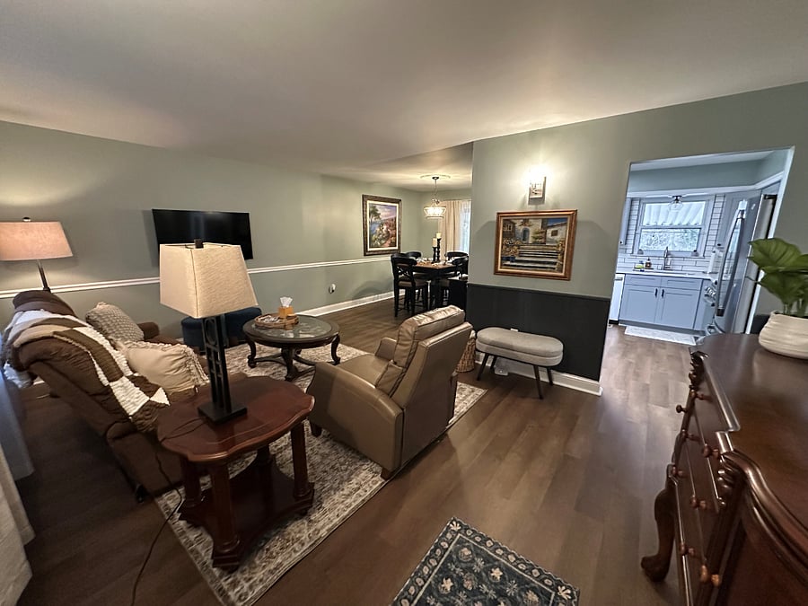 Living Room with TV, lazy boy couch and haverty recliner