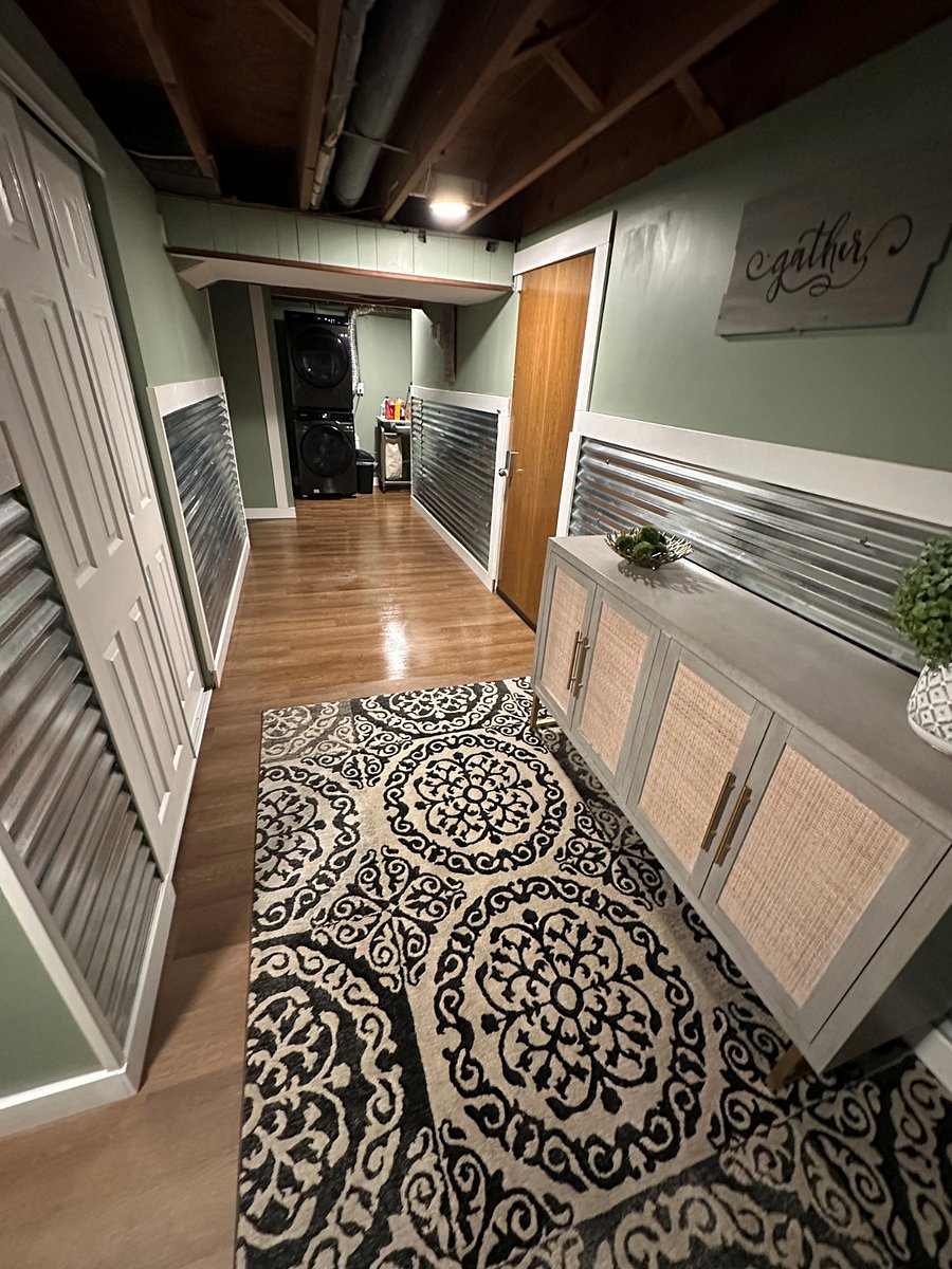 Downstairs Enterance and laundry area with coat closet