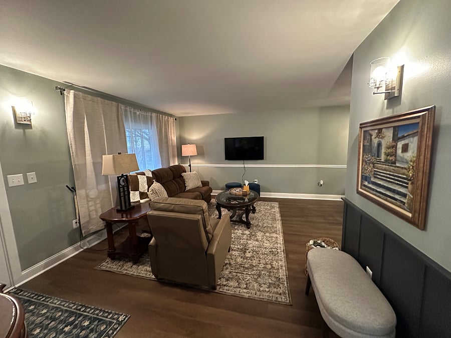 Living Room with TV, lazy boy couch and haverty recliner