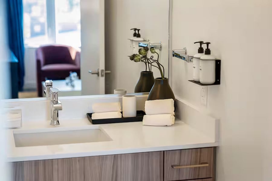 Soft tones and sleek fixtures elevate this peaceful space.
Your personal retreat for unwinding and resetting.
