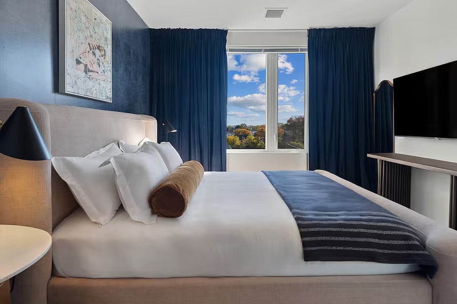 Comfort wrapped in sophistication.
This serene bedroom offers the perfect setting for restful nights.