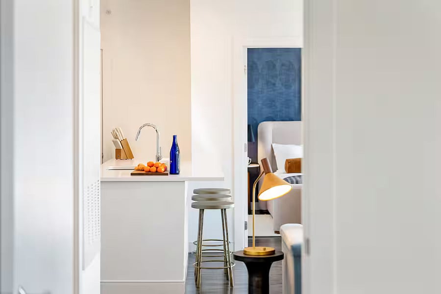 An elegantly appointed kitchen with a calming, open layout.
A perfect setting for both culinary inspiration and relaxed dining.