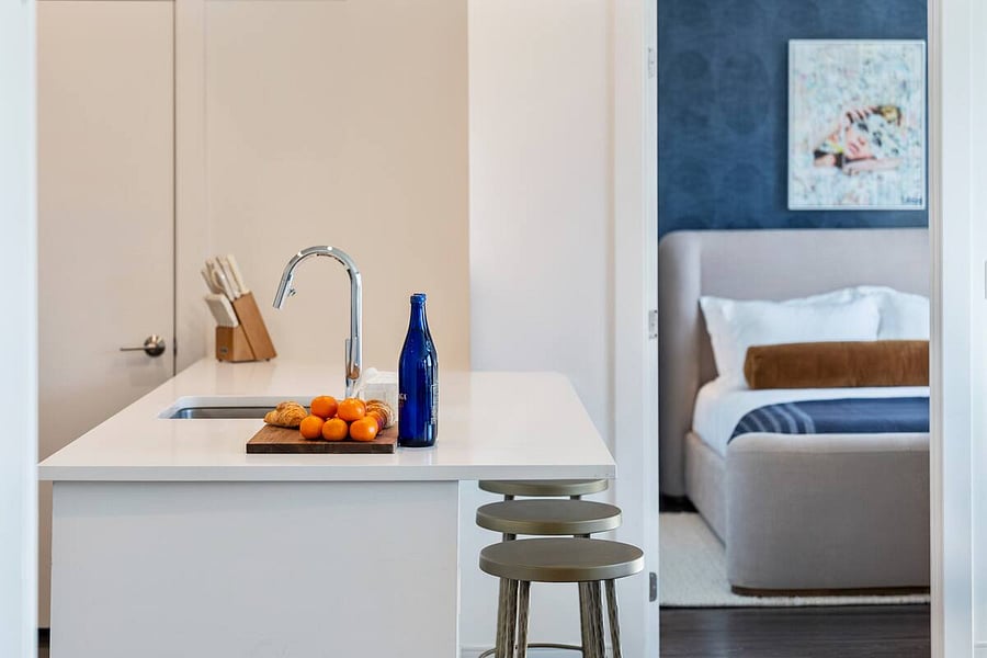 A sleek, modern kitchen that inspires creativity and comfort.
Gather around the island and enjoy time well spent.