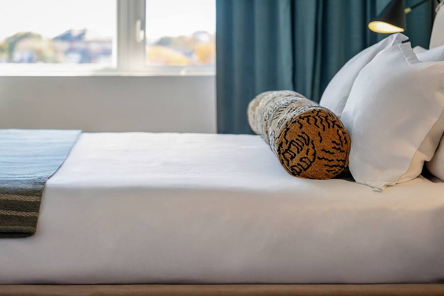 A serene retreat designed for complete relaxation.
Sink into soft linens and let the calm of this space embrace you.