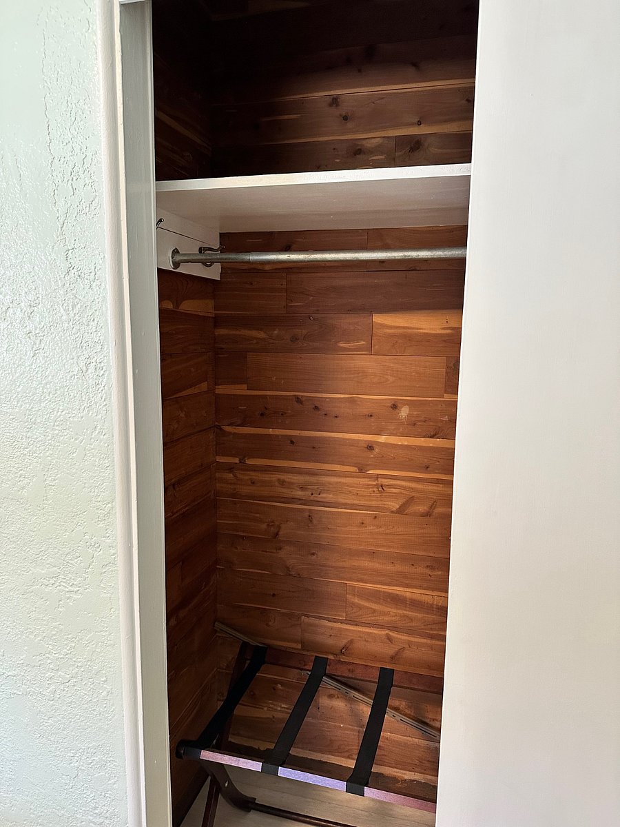 each bedroom has small cedar closet