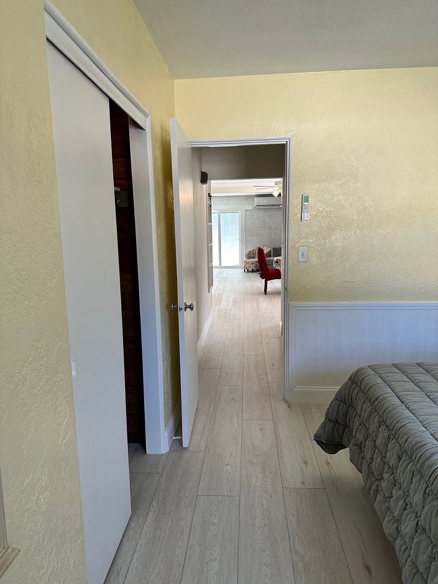 hall from front bedroom toward dining area