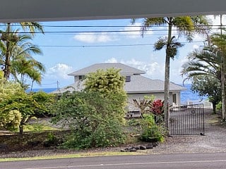 Looking east with two small views of the ocean on either side of the house.