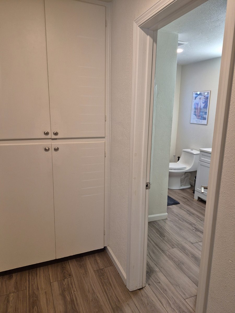Hall linen closet with towels and sheets
