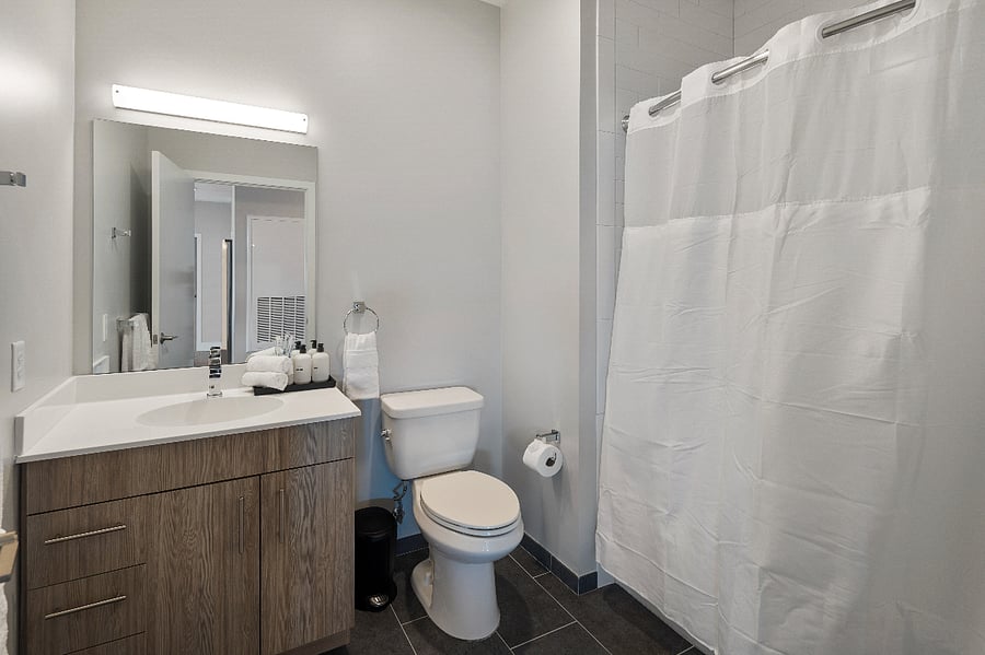 Soft tones and sleek fixtures elevate this peaceful space.
Your personal retreat for unwinding and resetting.