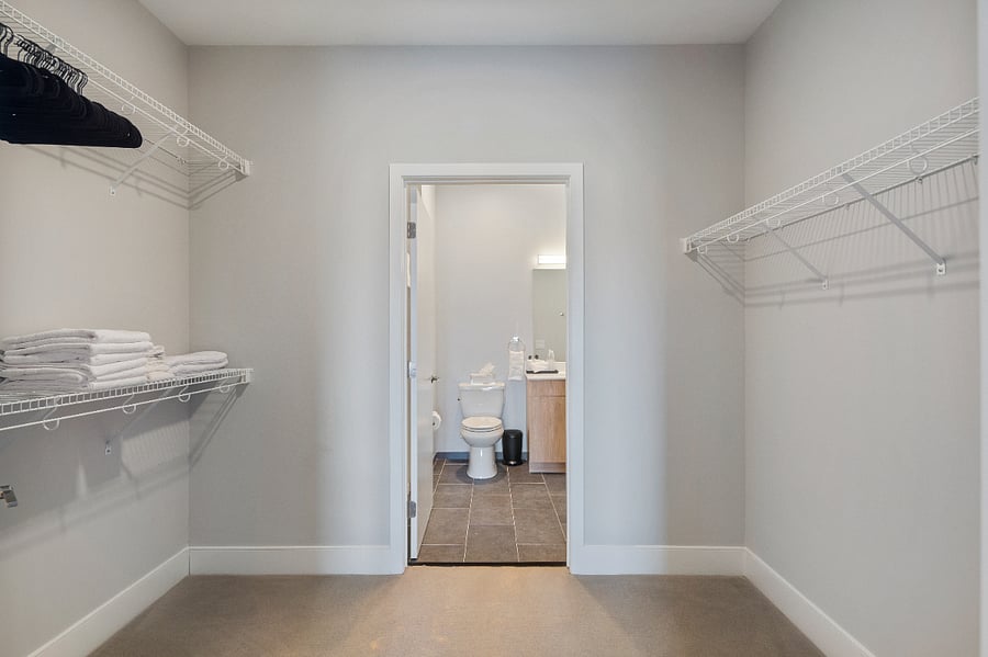 Polished surfaces and warm lighting set a tranquil mood.
Refresh and rejuvenate in this serene bathroom oasis.