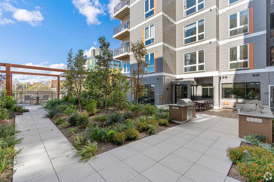 A striking exterior that sets the tone for an elevated stay.
Modern architecture meets timeless sophistication from the very first glance.
