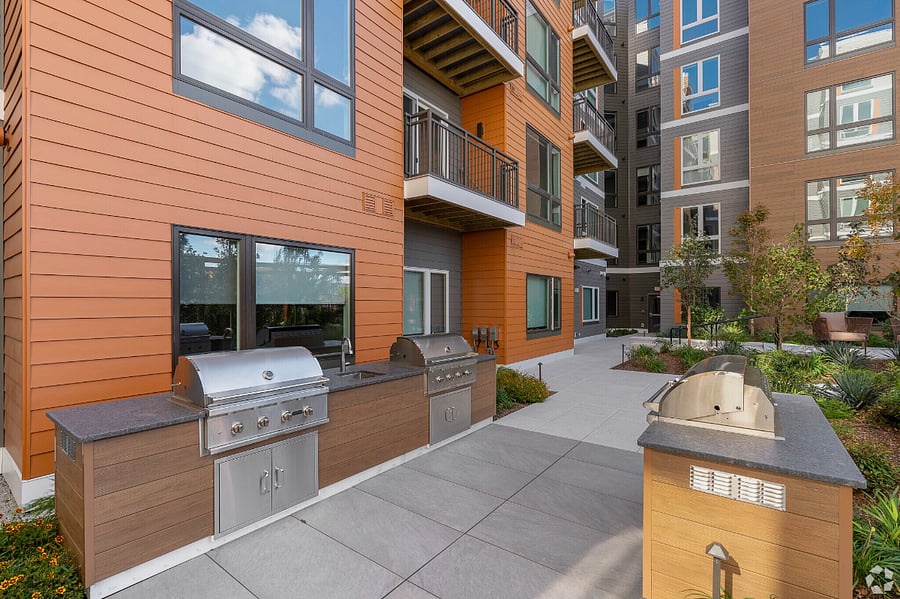 A serene courtyard designed for relaxed outdoor living. Enjoy BBQ gatherings in a space that feels warm, inviting, and refined.