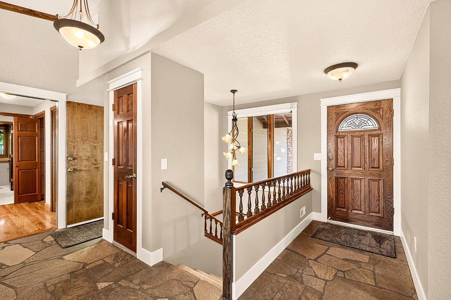 Main level entrance and hallway to kitchen