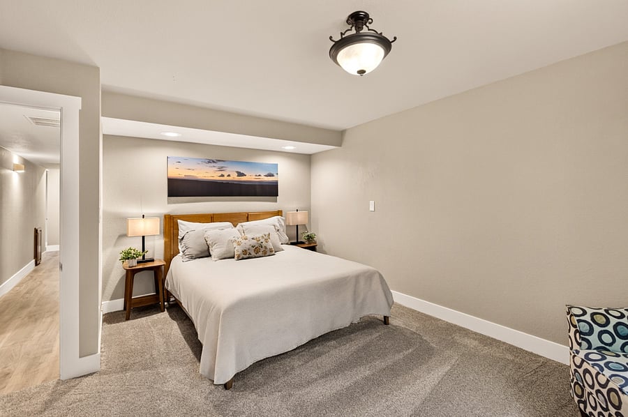 Lower level bedroom 4 with closet, sitting area and two work desks