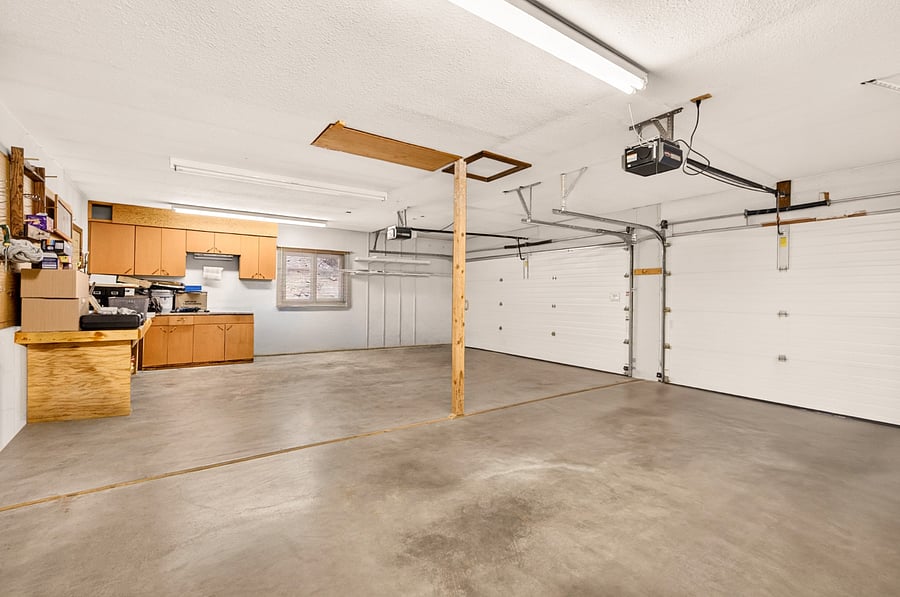 A spacious three-car attached garage offers secure covered parking, keeping your vehicles protected from Idaho's summer sun, winter snow, and changing weather. With room for multiple vehicles plus bicycles, skis, golf clubs, and outdoor gear, it's a valuable amenity rarely found in furnished rentals.