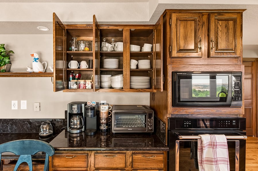 The kitchen comes fully stocked with everyday essentials, including dishes, bowls, glassware, coffee service (Mr Coffee and single-cup Keurig system), cookware, and countertop appliancesso you can unpack, settle in, and start living comfortably from your first day.