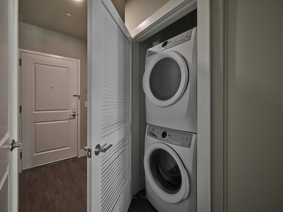 In unit Washer/dryer compartment for your washing convenience. We cover it all.