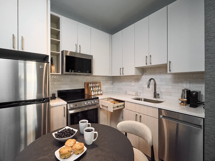A seamless blend of function and sophistication.
Your dining island and kitchen set the stage for relaxed, elevated living.