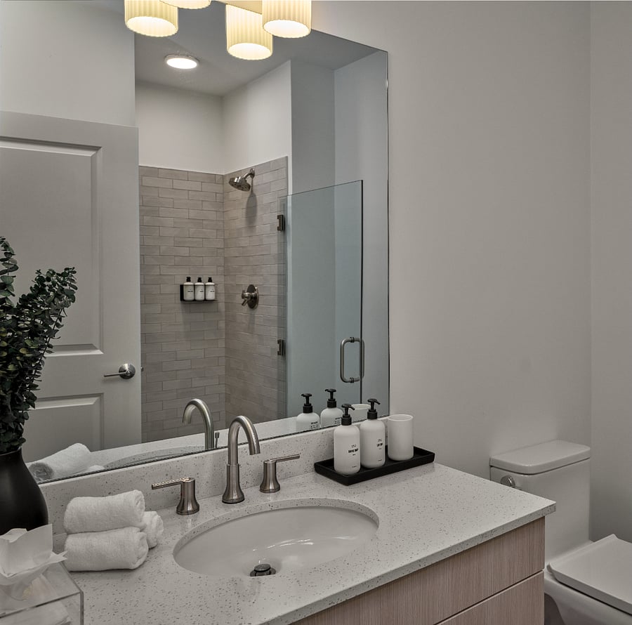 Crisp finishes and serene tones create a refreshing retreat.
Step into a bathroom crafted for comfort and indulgence.