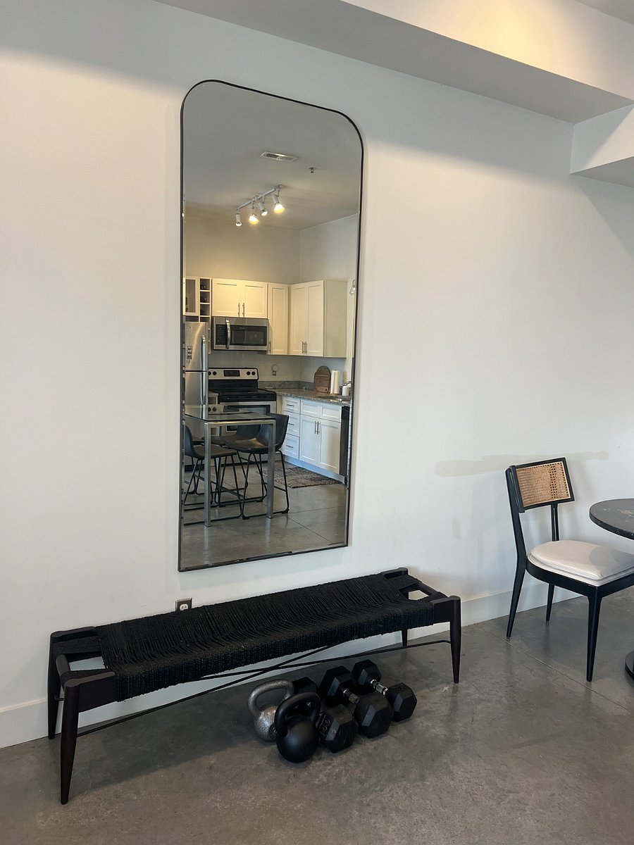 Entryway bench with second small table.