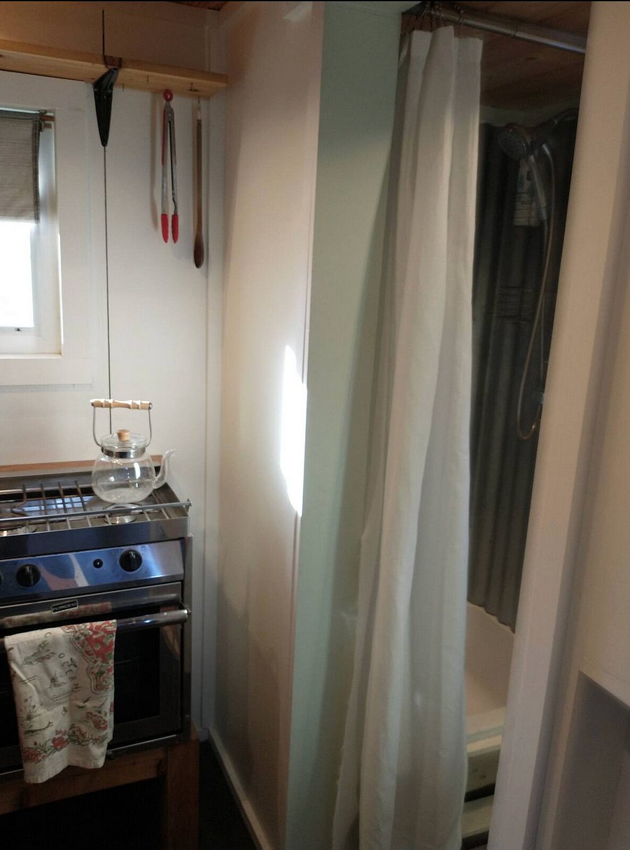 You can see the shower and the gas stove/oven here.