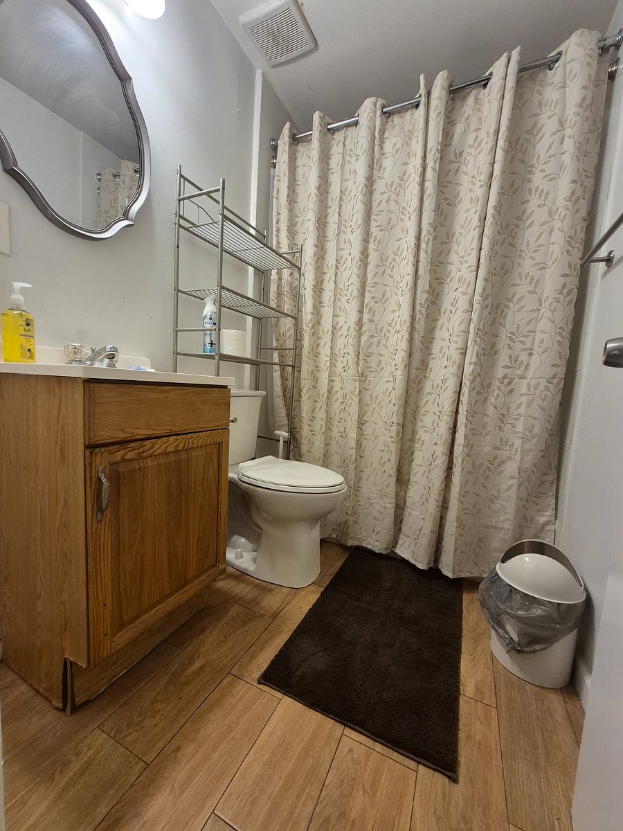 FULL BATHROOM WITH A BATHTUB
