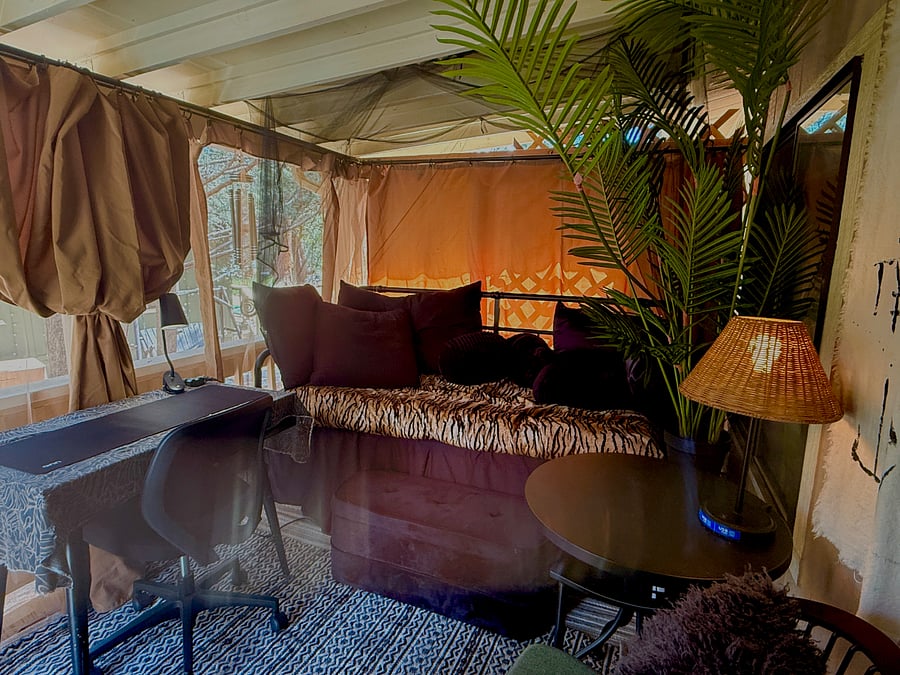 Front Porch with netted daybed for peaceful mornings or quiet evenings.